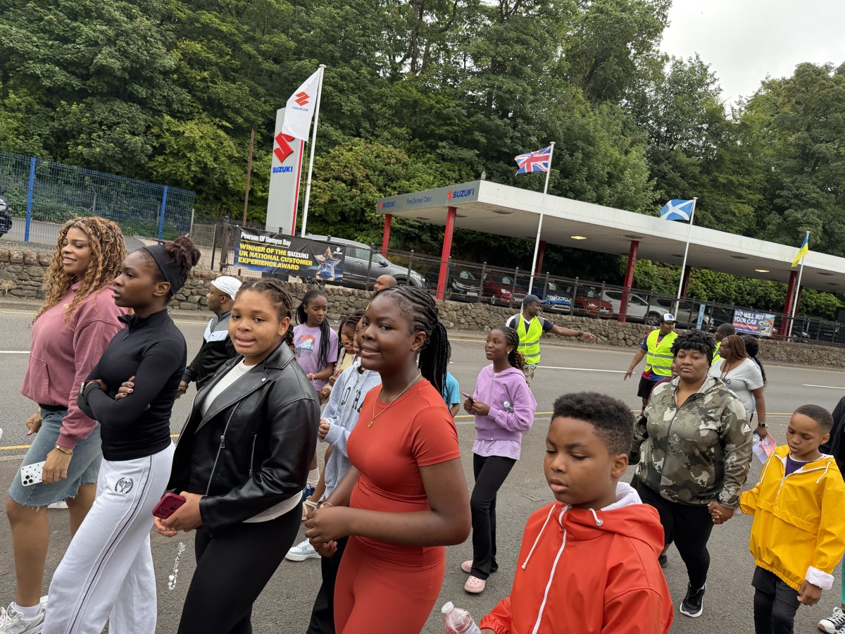 Young people walking together through Wemyss Bay